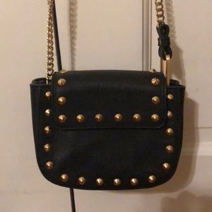 B Brian Atwood grommet purse/clutch